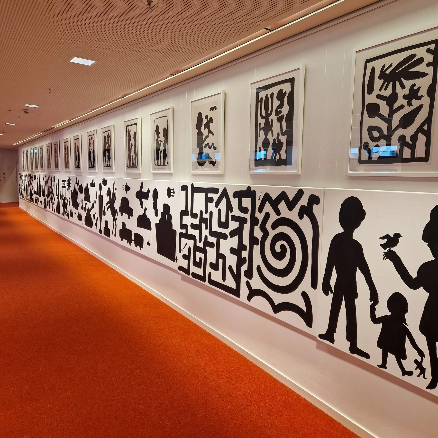 Gallery corridor with framed African art