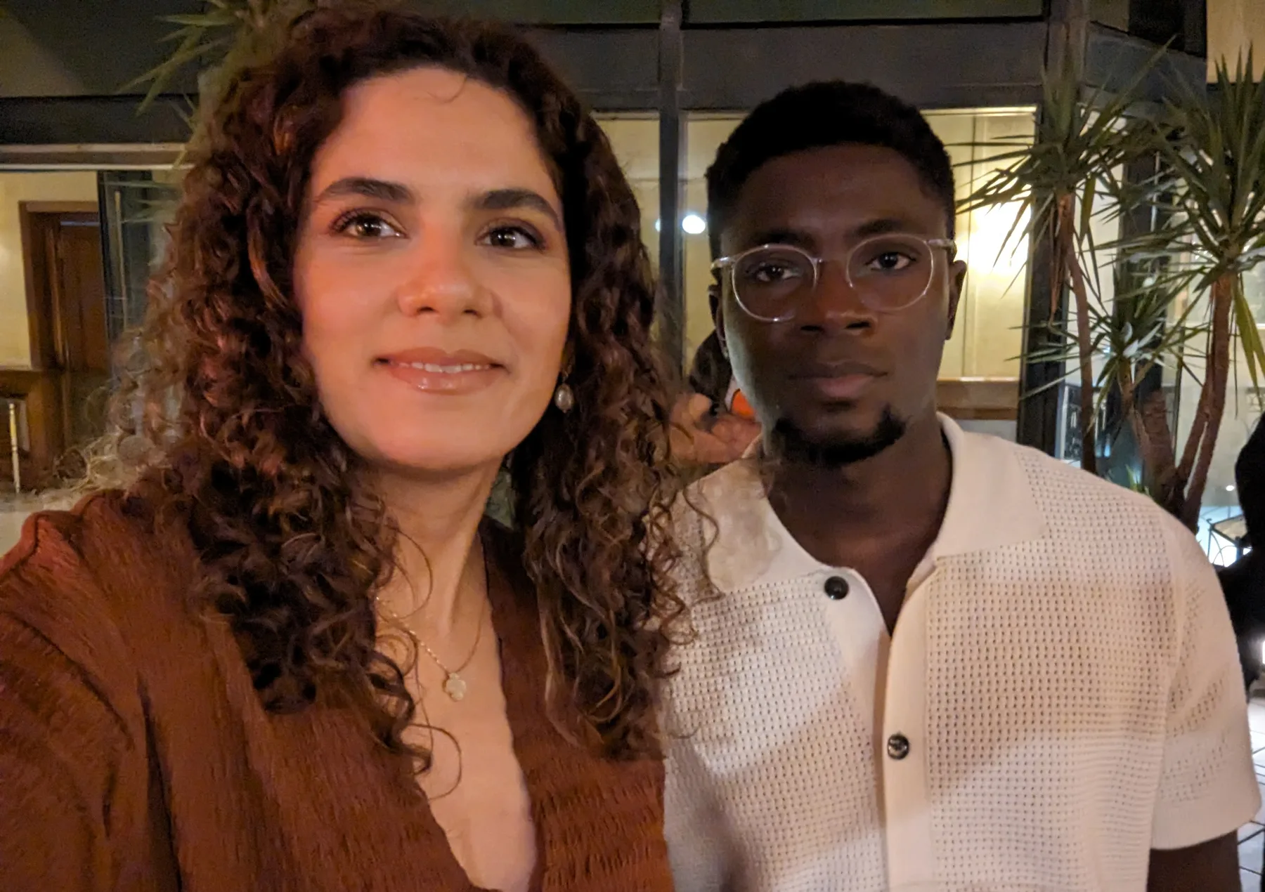 Hajer and Ramdane together, chest-up portrait